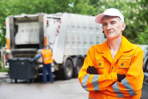 Professionals clearing garage clutter in Forest Gate