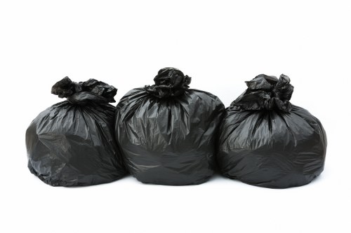 Workers segregating construction waste materials