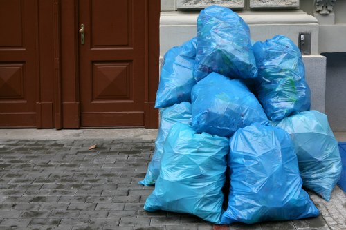 Construction workers handling waste clearance
